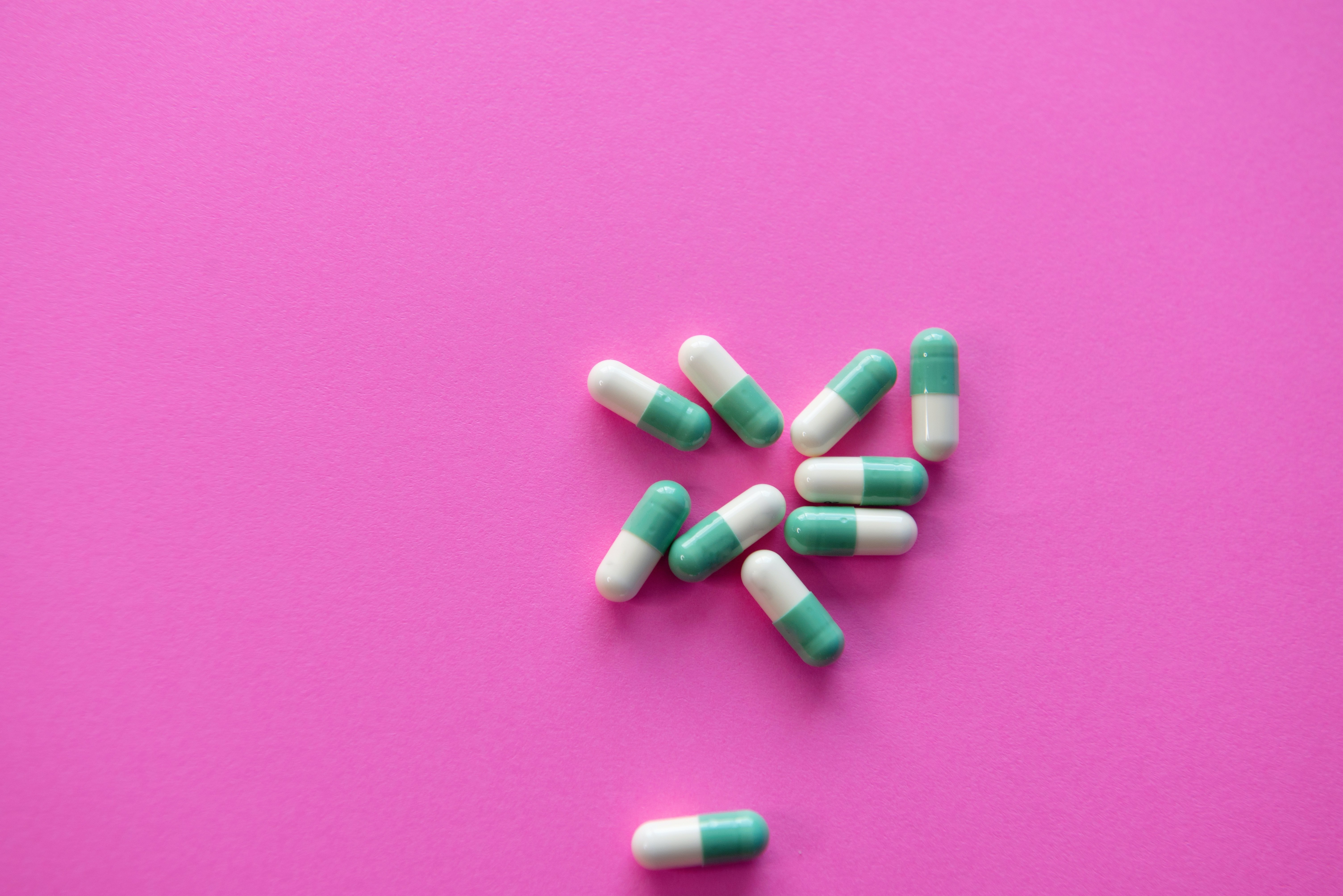 Pills on a pink background